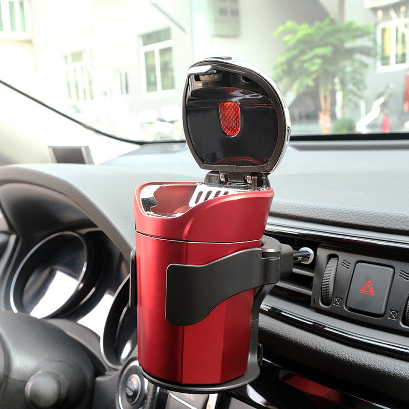 Monitoiminen mukiteline autoon