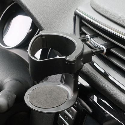 Monitoiminen mukiteline autoon
